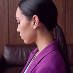Aqua Insight 14K gold-plated ear cuff on a model in a purple blazer, side profile