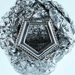 Mini Verta Earrings on a crystal sphere, geometric form detail