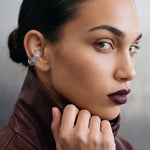 Model wearing the Octa Ear Cuff, burgundy leather jacket, rhodium-plated 925 sterling silver octagonal cartilage cuff