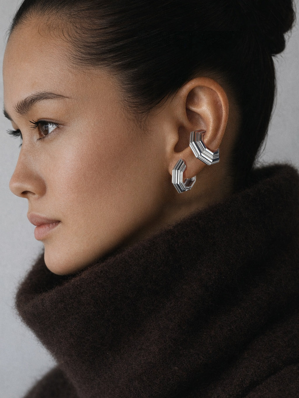 Octa Earrings styled with Octa Ear Cuff, brown turtleneck