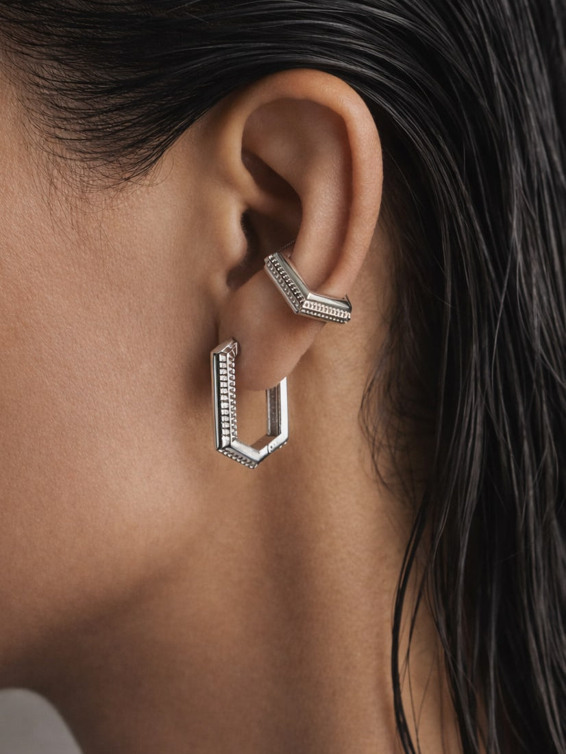 Trilux Earrings styled with an ear cuff, wet-look hair