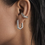 Trilux Earrings styled with an ear cuff, wet-look hair