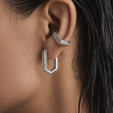 Trilux Earrings styled with an ear cuff, wet-look hair