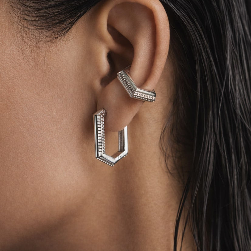 Trilux Earrings styled with an ear cuff, wet-look hair